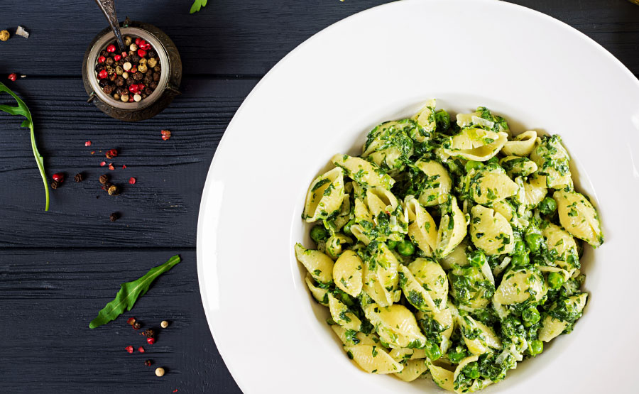 Conchiglie met spinazie en groene pesto